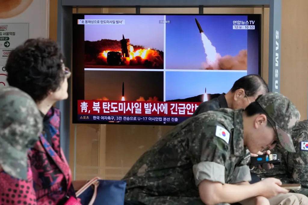 A TV screen shows file images of North Korean missiles launch during a news program at Seoul Railway Station in Seoul, South Korea on Oct. 12, 2026.