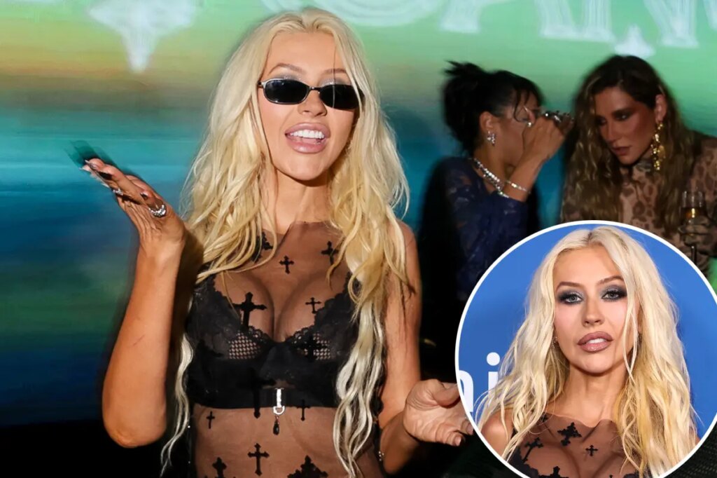 Iconic pop star, 45, stuns in sheer leather ensemble