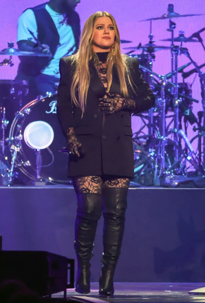 Kelly Clarkson performs onstage during a music festival.