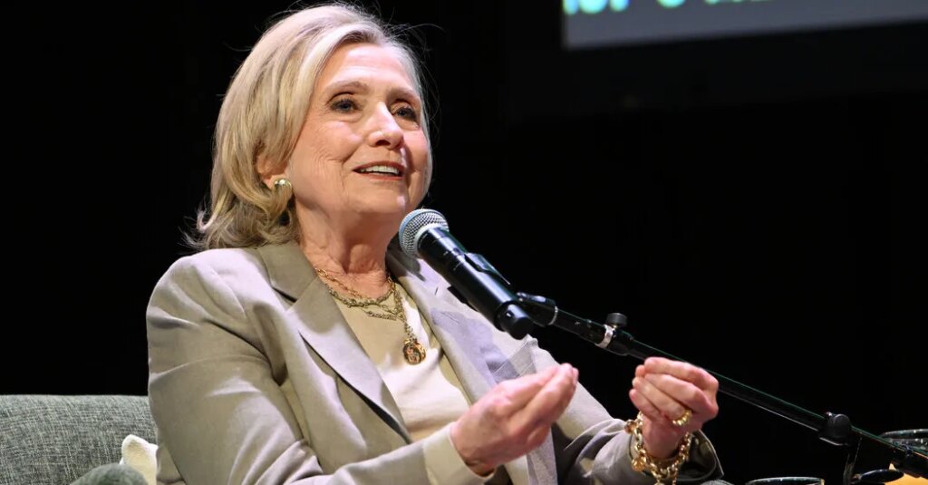 Hillary Clinton Steps to the Podcast Mic as Midterms Approach