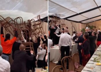 Quick-thinking wedding guests take matters into own hands to save reception from flooding