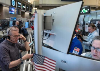 Stocks edge back from their record following the first big batch of profit reports for the summer