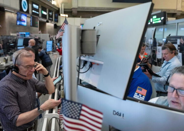 Stocks edge back from their record following the first big batch of profit reports for the summer