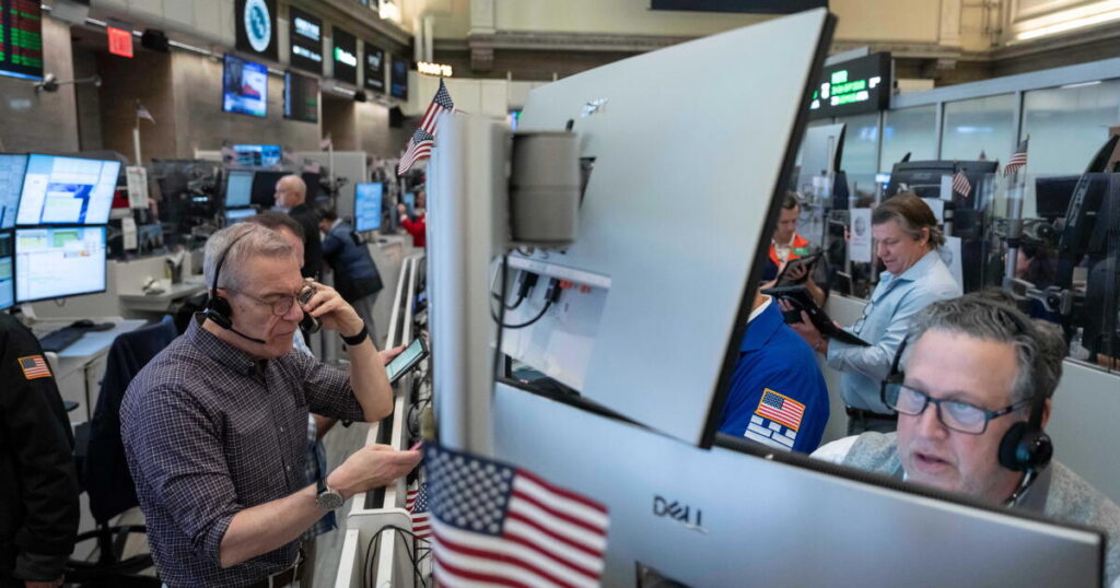 Stocks edge back from their record following the first big batch of profit reports for the summer