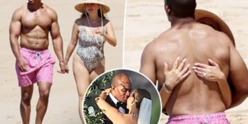 Jennifer Meyer and new husband Geoffrey Ogunlesi get handsy on Hawaii beach just hours after tying the knot