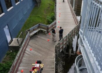 Five Who Lived Along Walking Trail Are Dead and the Police Hunt a Killer