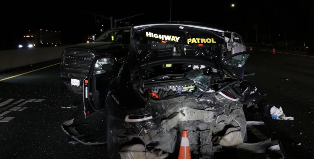 Tesla Running FSD Slams Into Police Cruiser After Driver Falls Asleep Behind the Wheel, Hospitalizing Two Officers With Serious Injuries