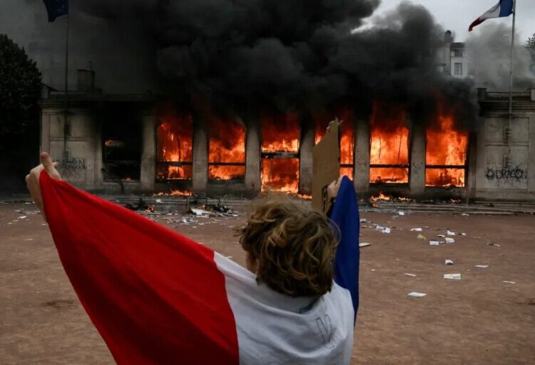 ‘France, truly, is on the brink’ and just days away from a make-or-break moment in its debt crisis, analyst warns, as protests turn into riots