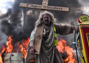 France is rioting over surging inflation, skyrocketing national debt and crumbling schools. America is its sleeping twin