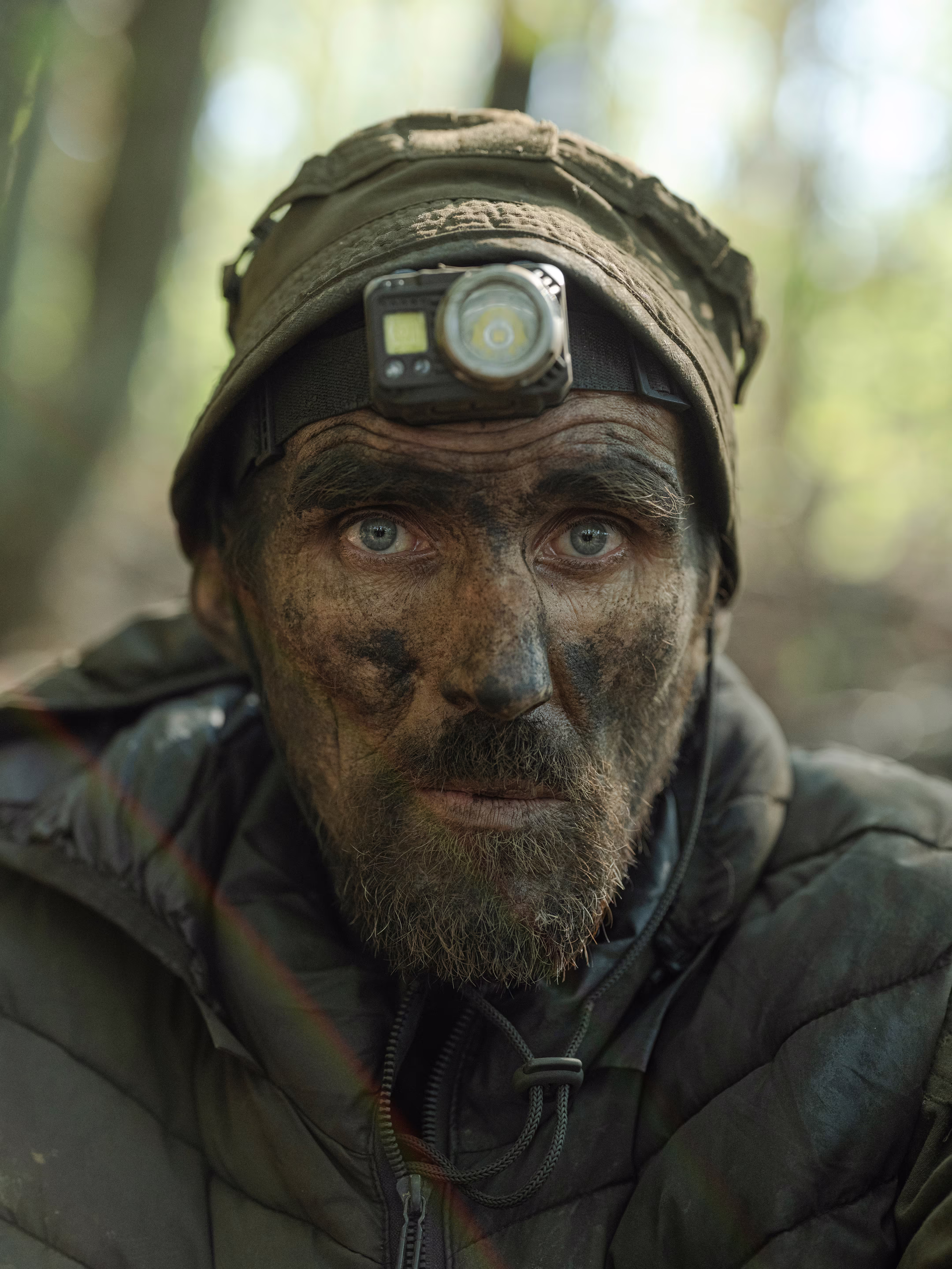 a man covered in soot
