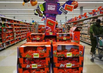 America skimps on Halloween as high fuel prices force shoppers to buy small bags of candy and abandon large sizes