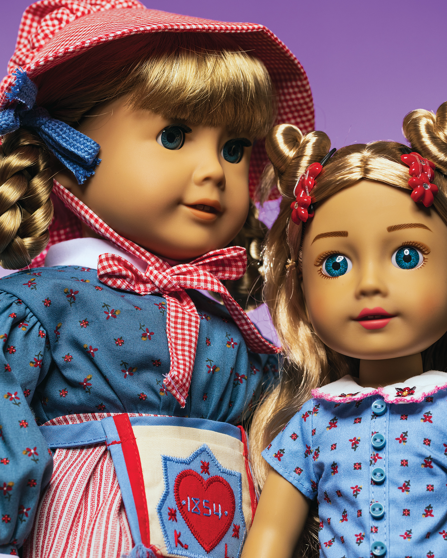 photo of original Kirsten doll next to Modern Era Kirsten
