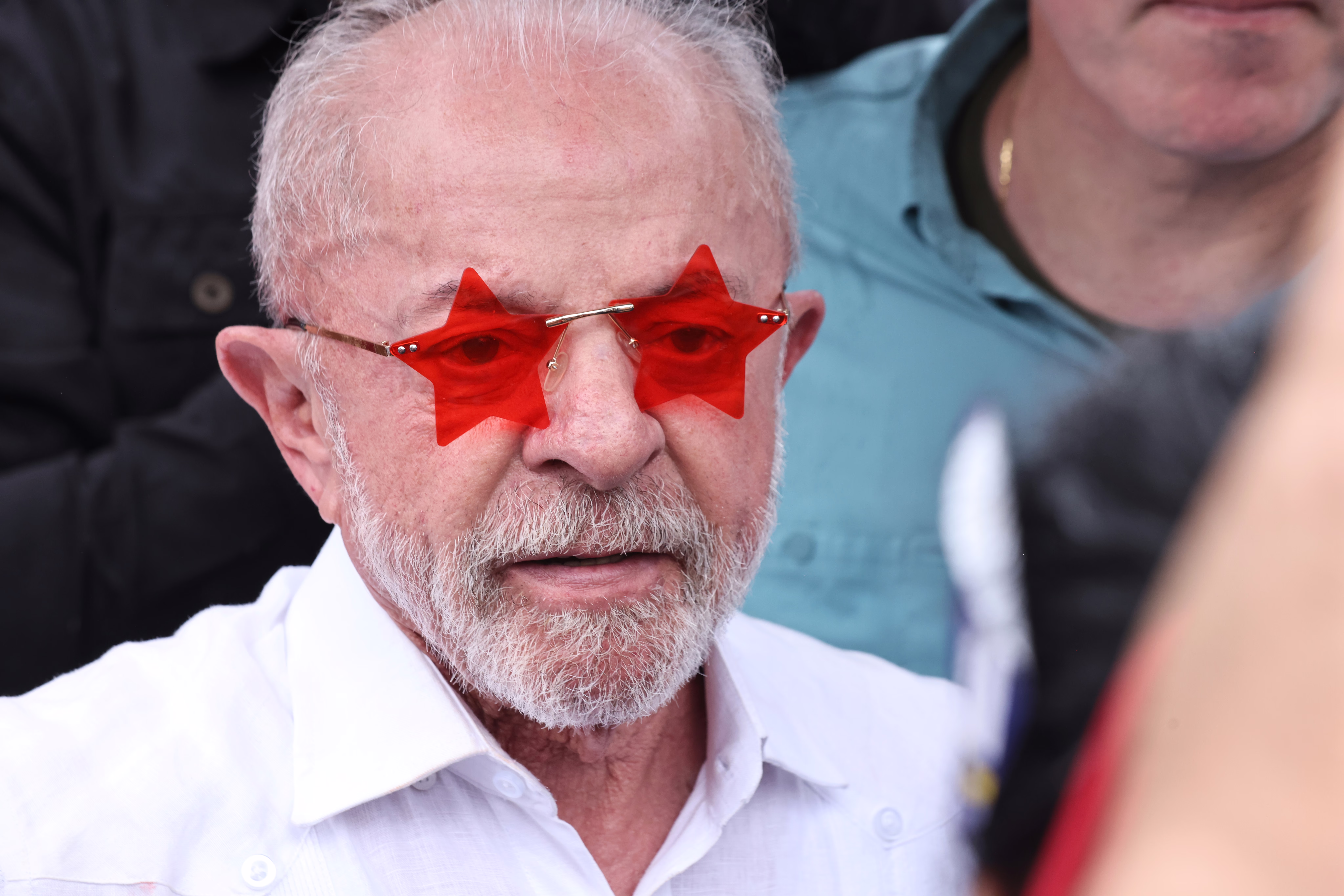 Luiz Inácio Lula Da Silva, Brazil's president, wearing red-tinted star-shaped sunglasses