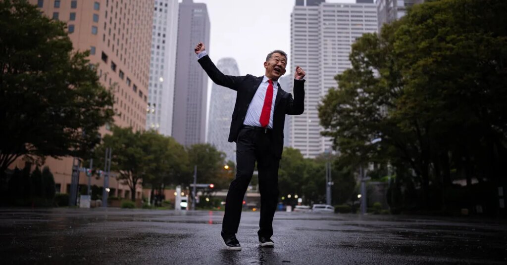 Rain or Shine, Japan’s ‘Dancing Salaryman’ Can’t Stop Grooving