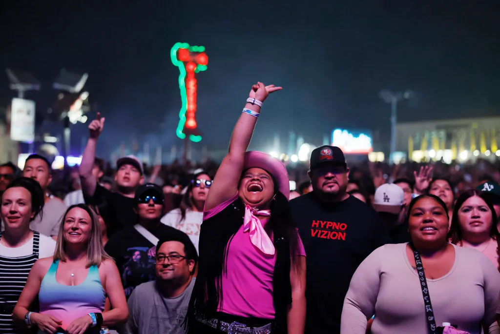 Visitors cheer as Diplo performs at the Big Fresno Fair at Fresno Fairgrounds.
