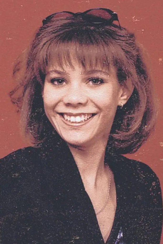 Photo of Chynna Dickus smiling with sunglasses resting on her head.