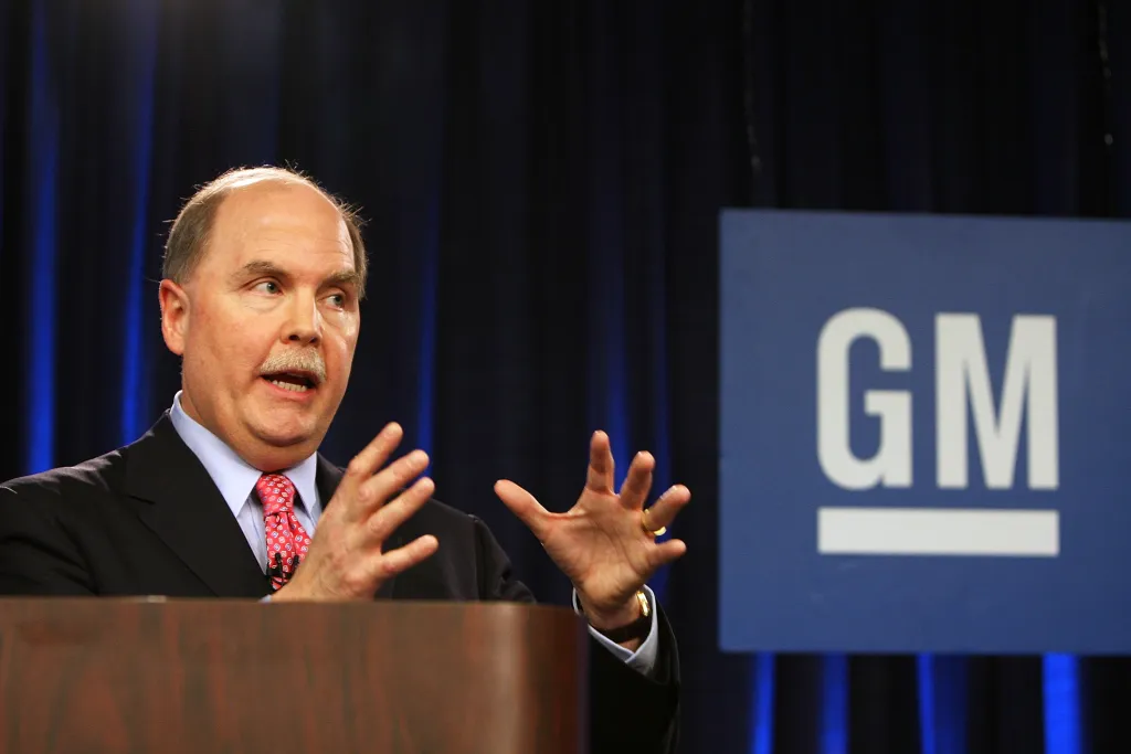 General Motors CEO Fritz Henderson gestures while speaking at a news conference regarding the company's Chapter 11 bankruptcy filing.
