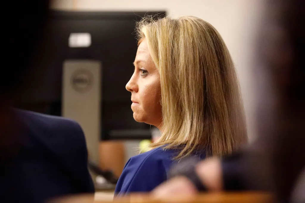 Former Dallas police Officer Amber Guyger listens during her murder trial.