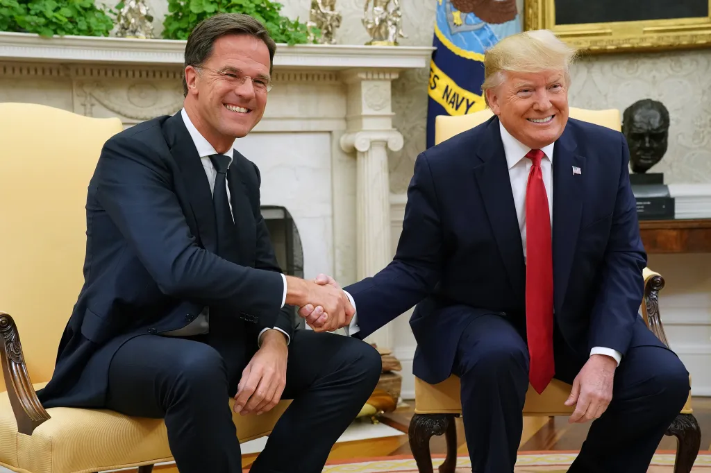 President Trump and Dutch Prime Minister Mark Rutte pose for photographs after talking to reporters in the Oval Office at the White House in Washington, on July 18, 2019. 