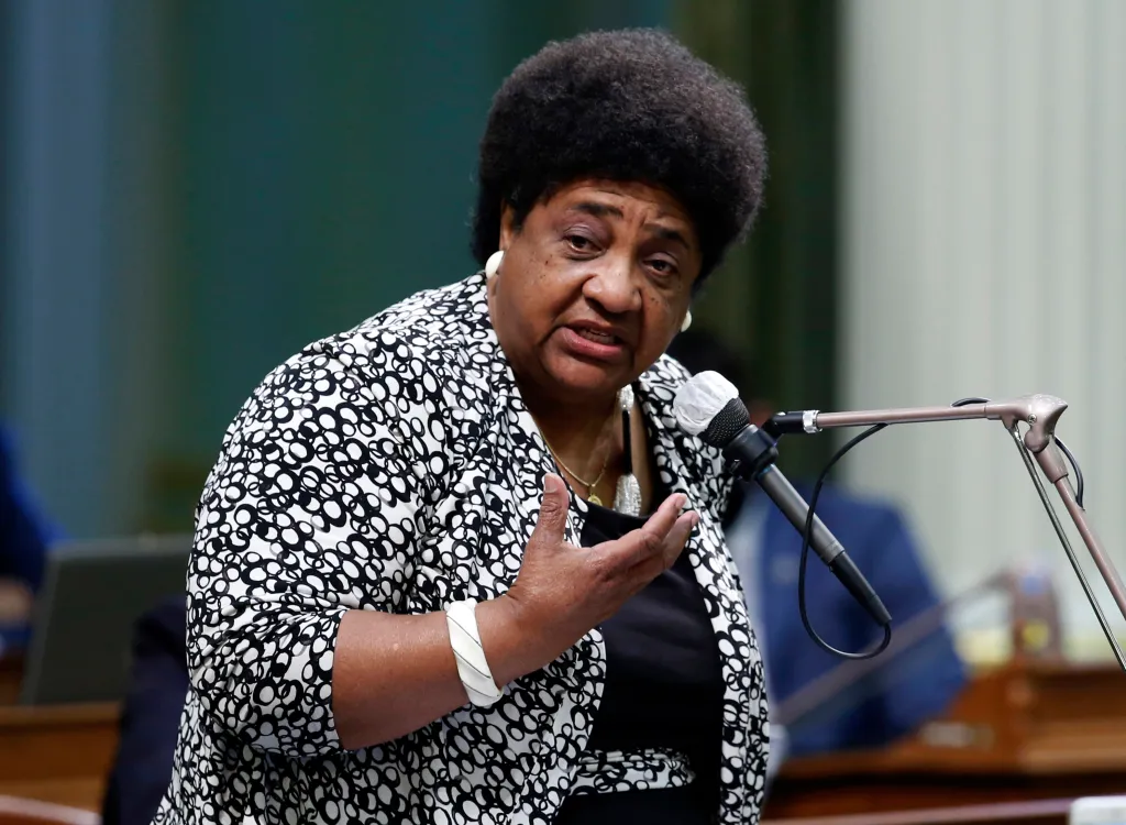 Assemblywoman Shirley Weber speaks at a podium.