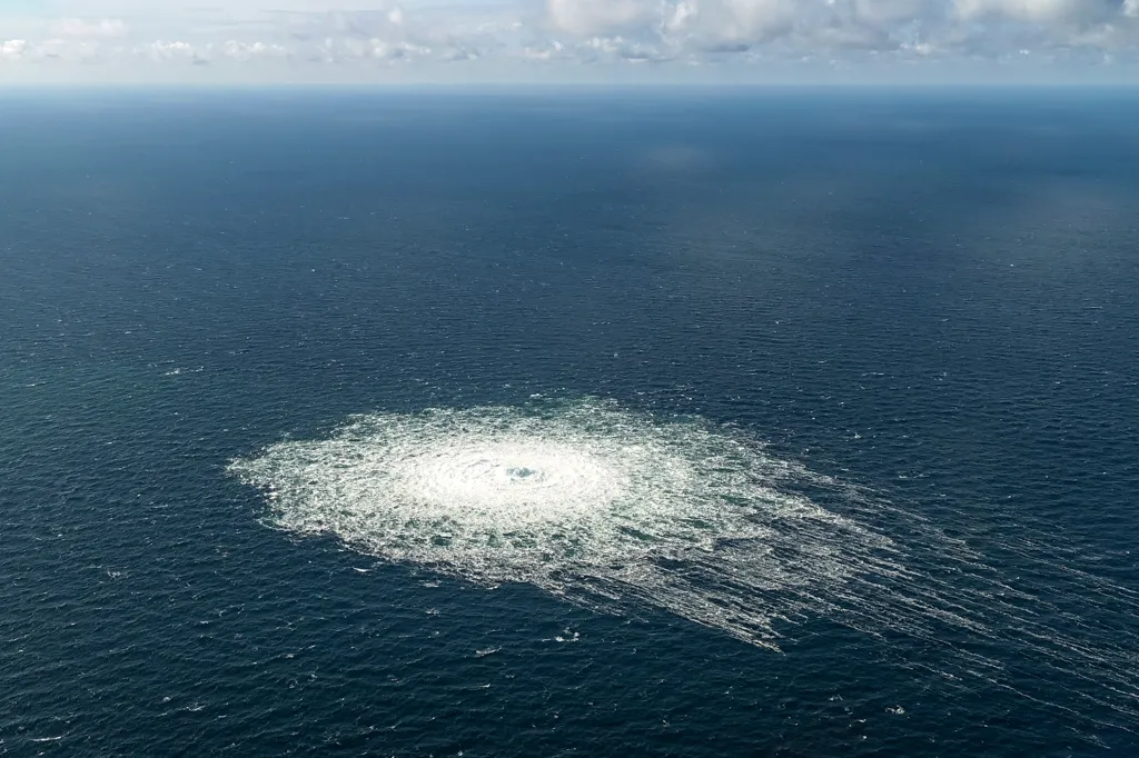 A large disturbance in the sea is observed off the coast of the Danish island of Bornholm, on Sept. 27, 2022, following a series of unusual leaks on two natural gas pipelines running from Russia under the Baltic Sea to Germany.