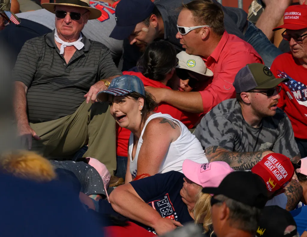 Helen Comperatore calls for aid moments after a shooting during a campaign rally.