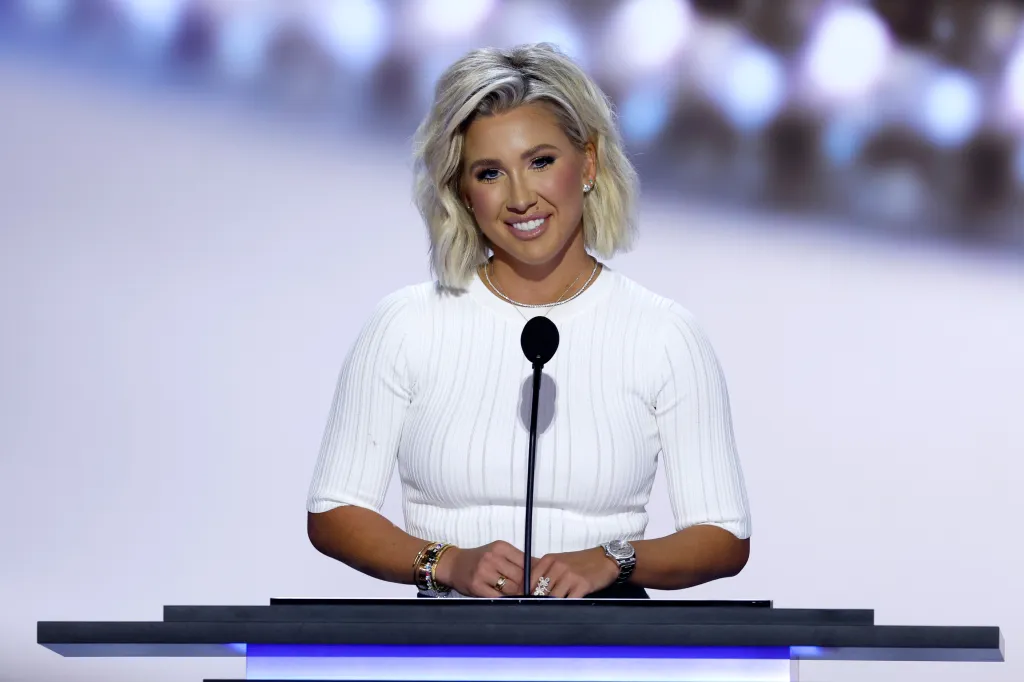 Savannah Chrisley speaks at a podium during the Republican National Convention.