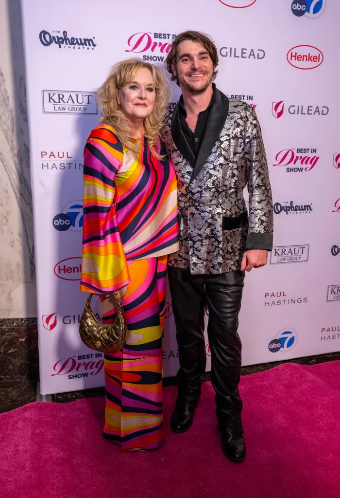 Actor RJ Mitte and his mother, Dyna Mitte, pose on the pink carpet at the 2025 Best In Drag Show at The Orpheum Theatre in Los Angeles, California.