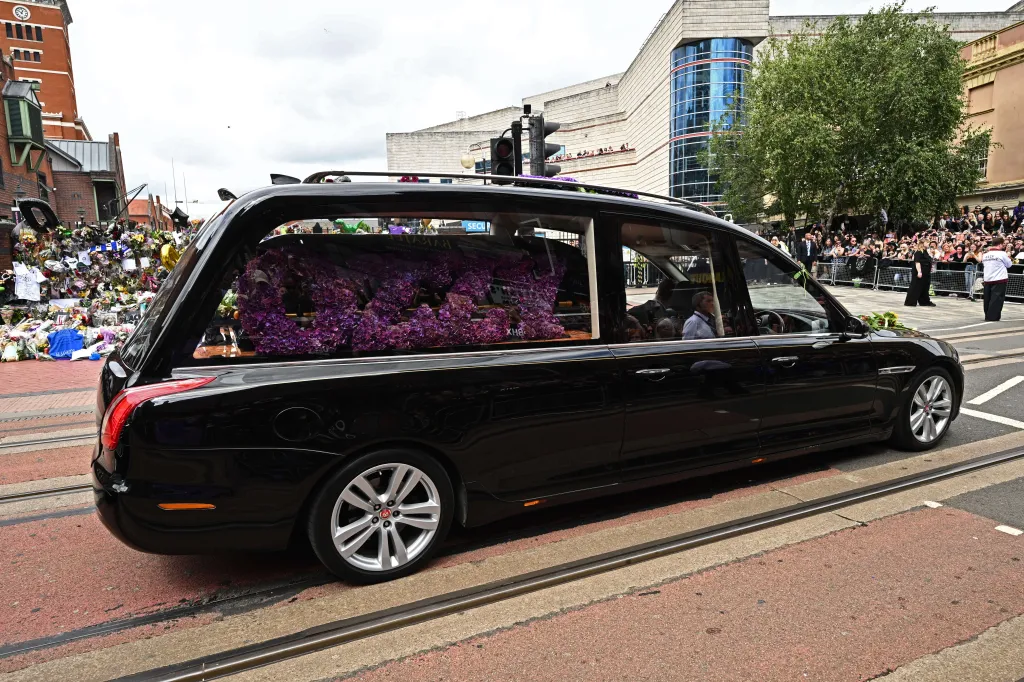 The funeral cortege for Ozzy Osbourne travels through Birmingham, England.