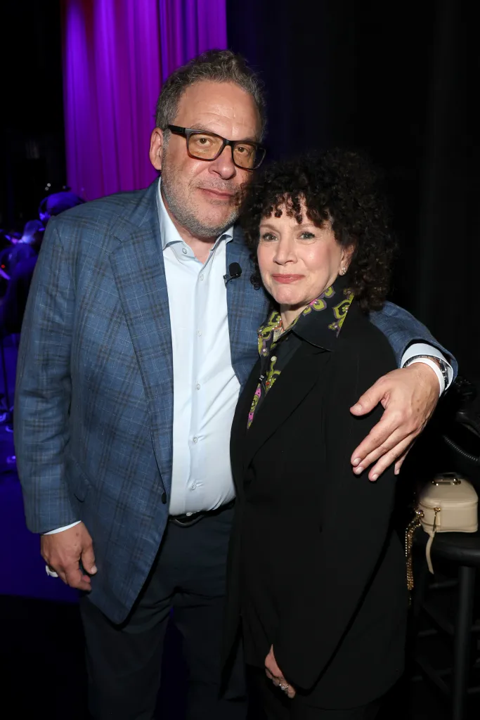 Jeff Garlin and Susie Essman pose together at an event.