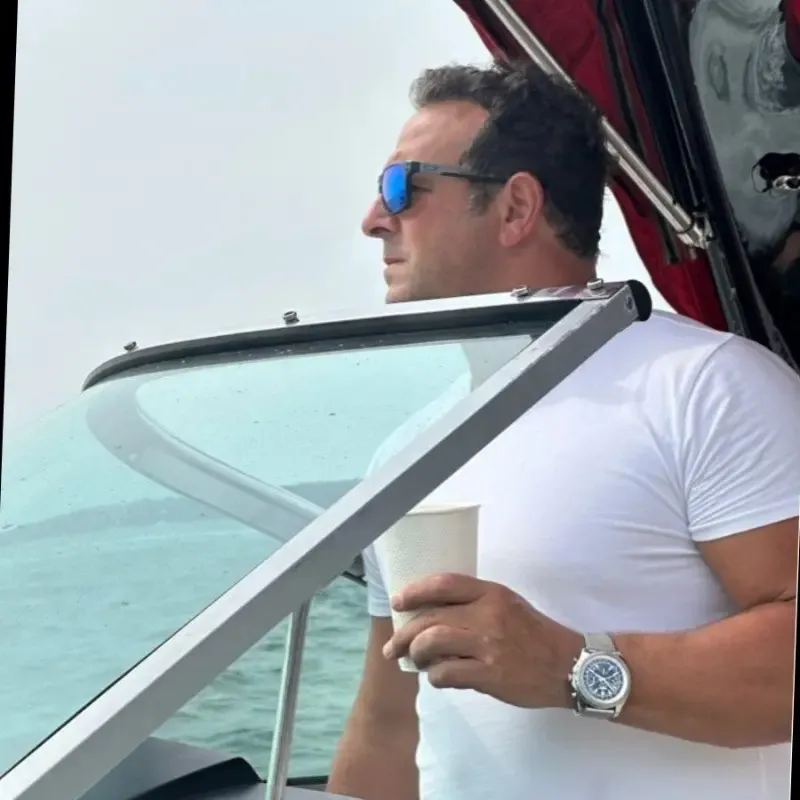 Mangiameli on the open waters on his boat.