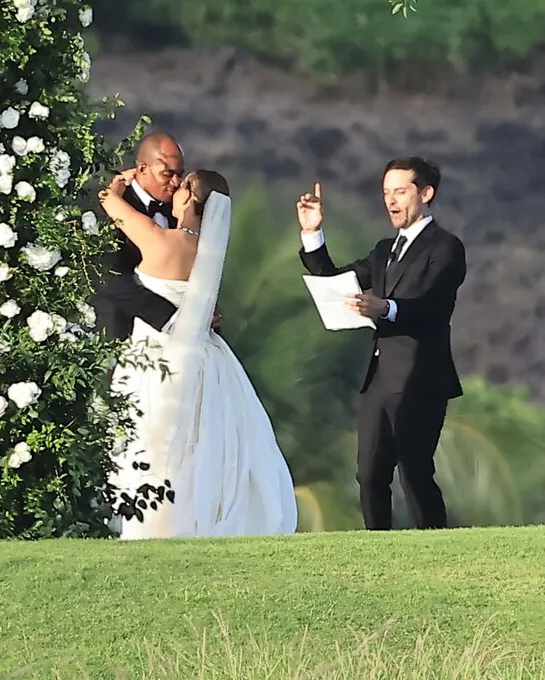 Tobey Maguire officiates the wedding of his ex-wife Jennifer Meyer to Geoff Ogunlesi in Hawaii.