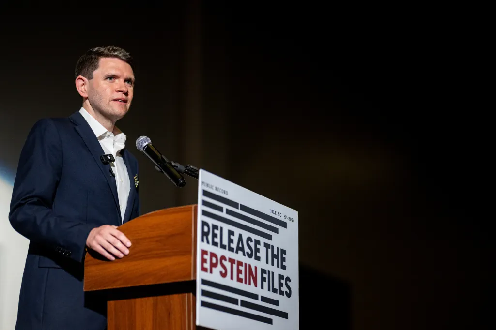 Texas Democratic Senate candidate James Talarico speaks at a podium with a sign that reads
