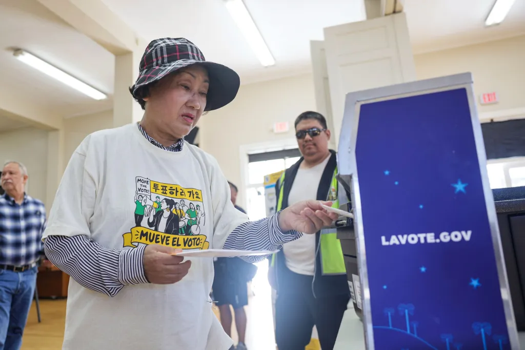 A voter casts a ballot at a voting center.