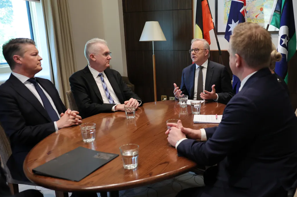 Australian Prime Minister Anthony Albanese meets with law enforcement heads, including Home Affairs Minister Tony Burke and Victorian Premier Ben Carroll, at the Commonwealth Offices in Melbourne.