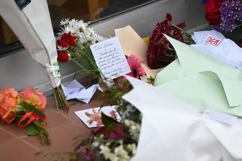Tributes and flowers left outside Independent federal MP Helen Haines' electoral office.