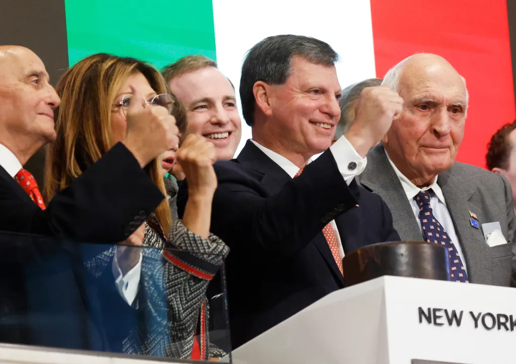 Social Security Administration Commissioner Frank Bisignano smiles and raises his fist while ringing the opening bell at the New York Stock Exchange.
