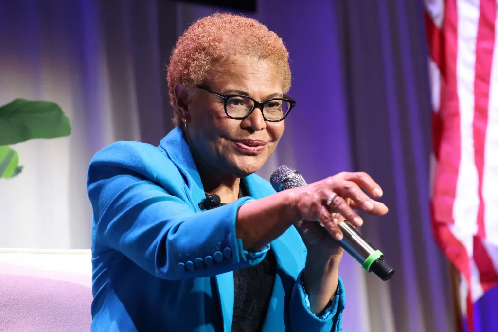 Los Angeles Mayor Karen Bass speaks into a microphone while gesturing during the Jewish Los Angeles Mayoral Forum.