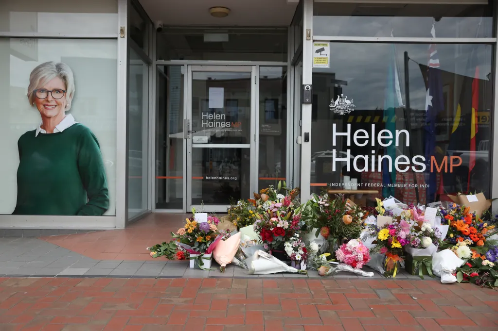 Floral tributes placed outside the office of Australian lawmaker Helen Haines.