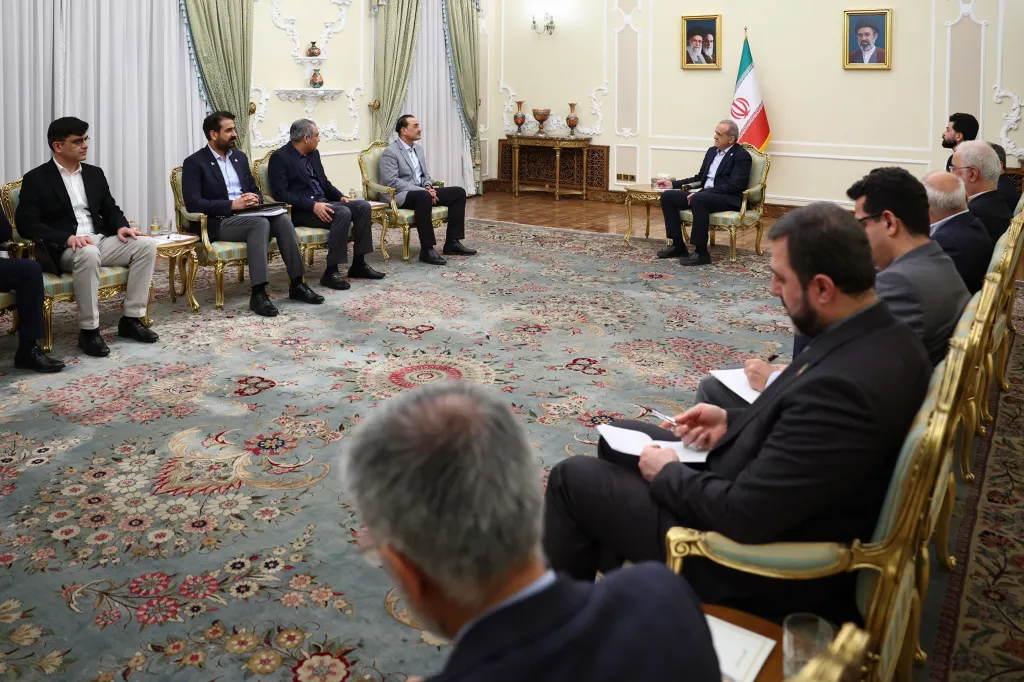 Iranian President Masoud Pezeshkian sits opposite members of a Pakistani delegation, including army chief Field Marshal Asim Munir, during talks in Tehran, Iran, on Oct. 20, 2026. 