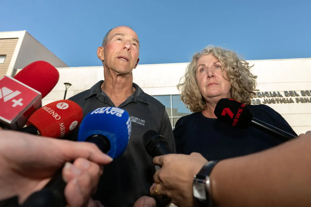 Martin and Debra Robinson speak to reporters following the trial of suspects in their sons' murders.