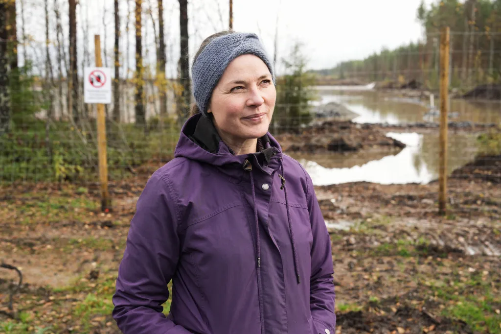Hanna Halmenpaa, chair of the board of the Finnish Association for Nature Conservation, is pictured near the site where Google's new data center is set to be built before construction was suspended.