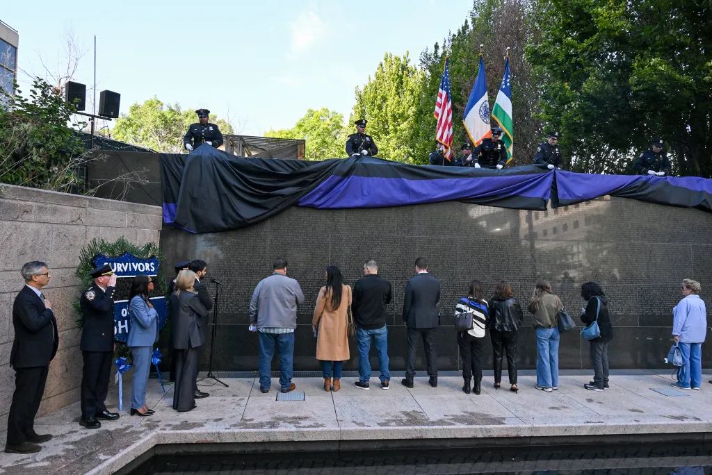 New York Mayor Zorhan Mamdani and Police Commissioner Jessica Tisch attend a ceremony to unveil the names of fallen officers added to the NYC Police Memorial Wall.