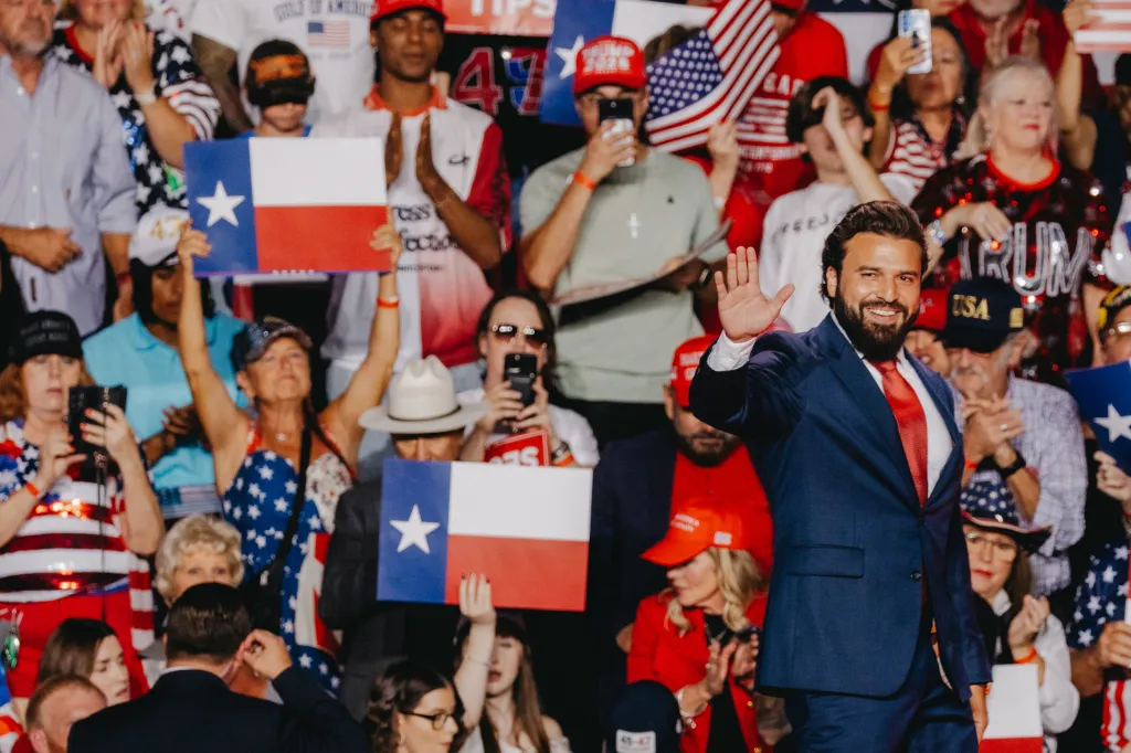 Republican U.S. Congressional candidate Brandon Herrera waves to the crowd during a campaign event.