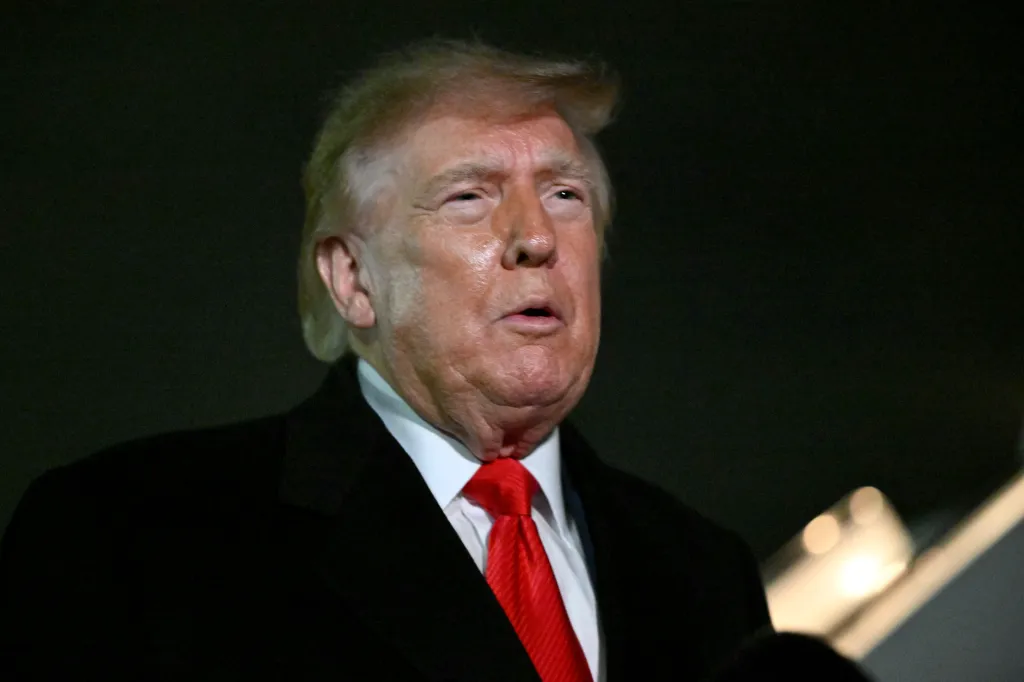 U.S. President Donald Trump speaks with reporters upon his arrival at Joint Base Andrews, Maryland.