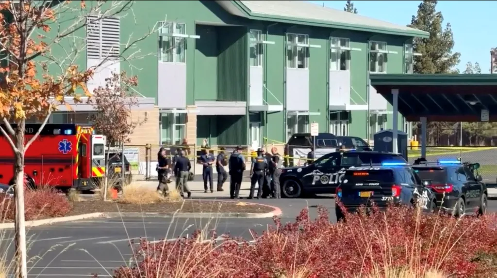 Emergency responders and police vehicles outside Silver Rail Elementary School.