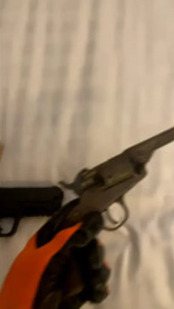 Natland was arrested at a hotel in Huddersfield in northern England with two guns and ammunition two days after arriving in the UK. 