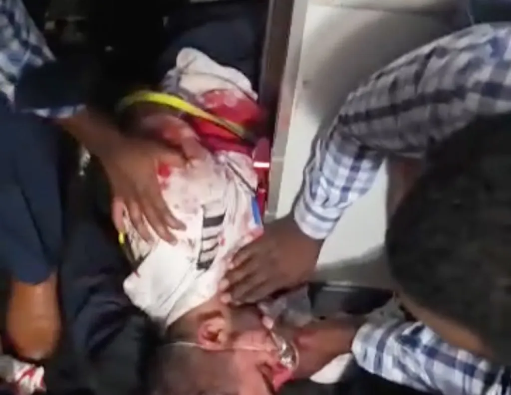 The injured co-pilot of a FlyDubai plane is seen bound and injured on the floor.