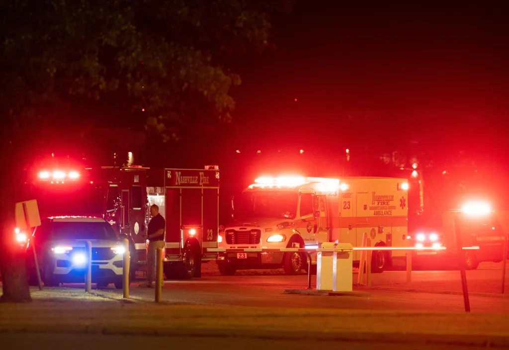 Emergency vehicles arrive at Riverbend Maximum Security Institution at night.