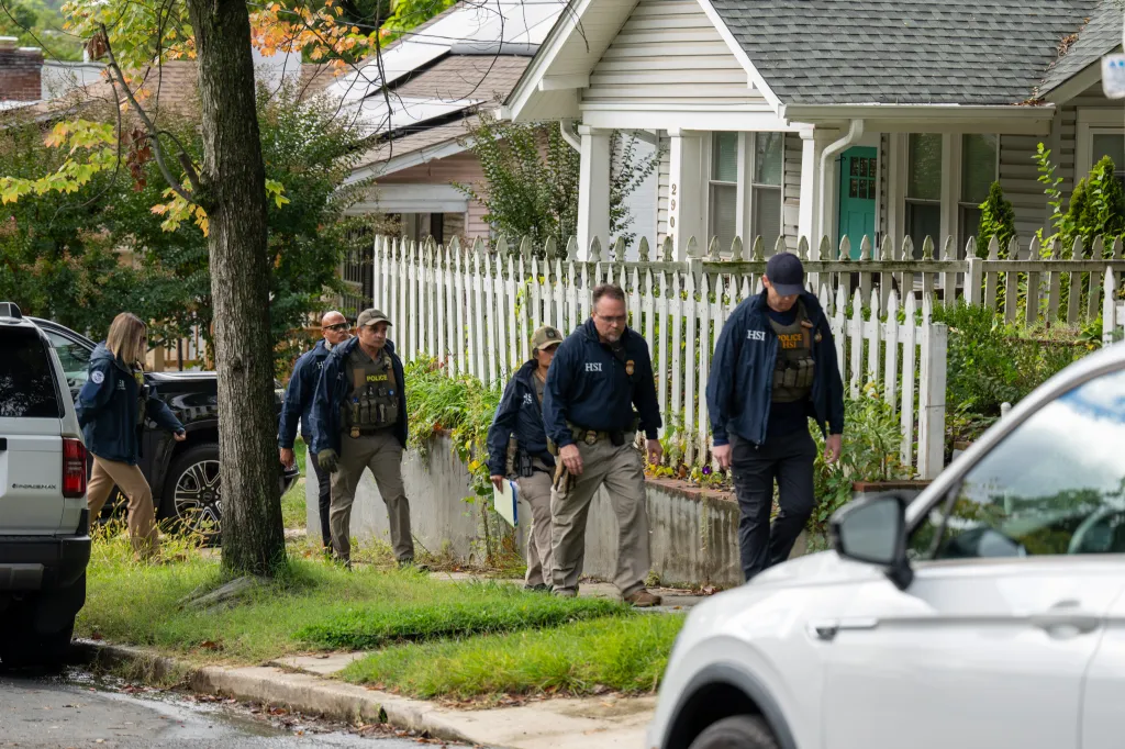 Homeland Security Investigations police search the home of Rep. Ilhan Omar in Washington, DC.